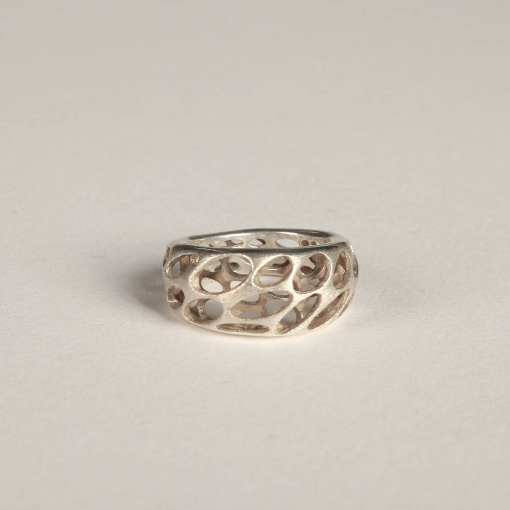 Ring with Layered Eyelet Motif