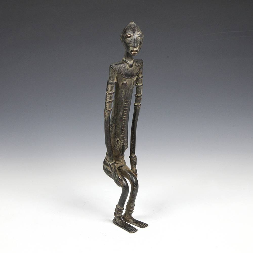 Standing Male Figure with Hands on Legs